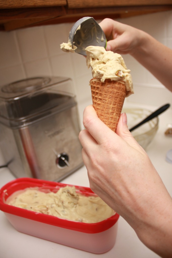 Alyssa packs an ice cream cone with pistachio gelato