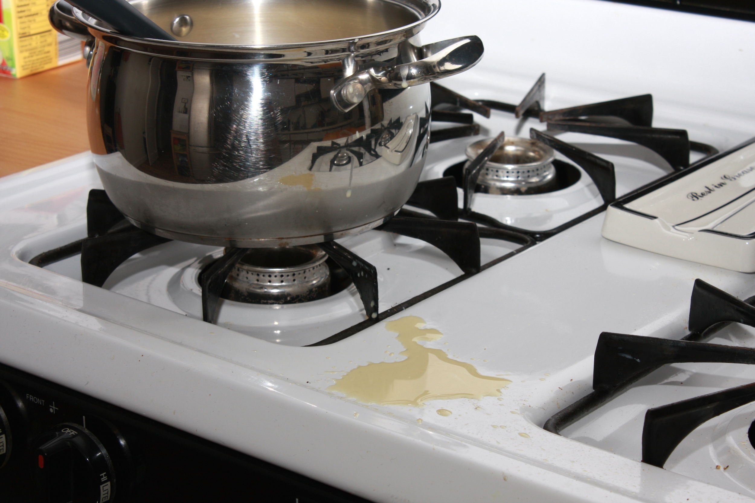 A puddle of Pistachio Ice Cream base on the stove