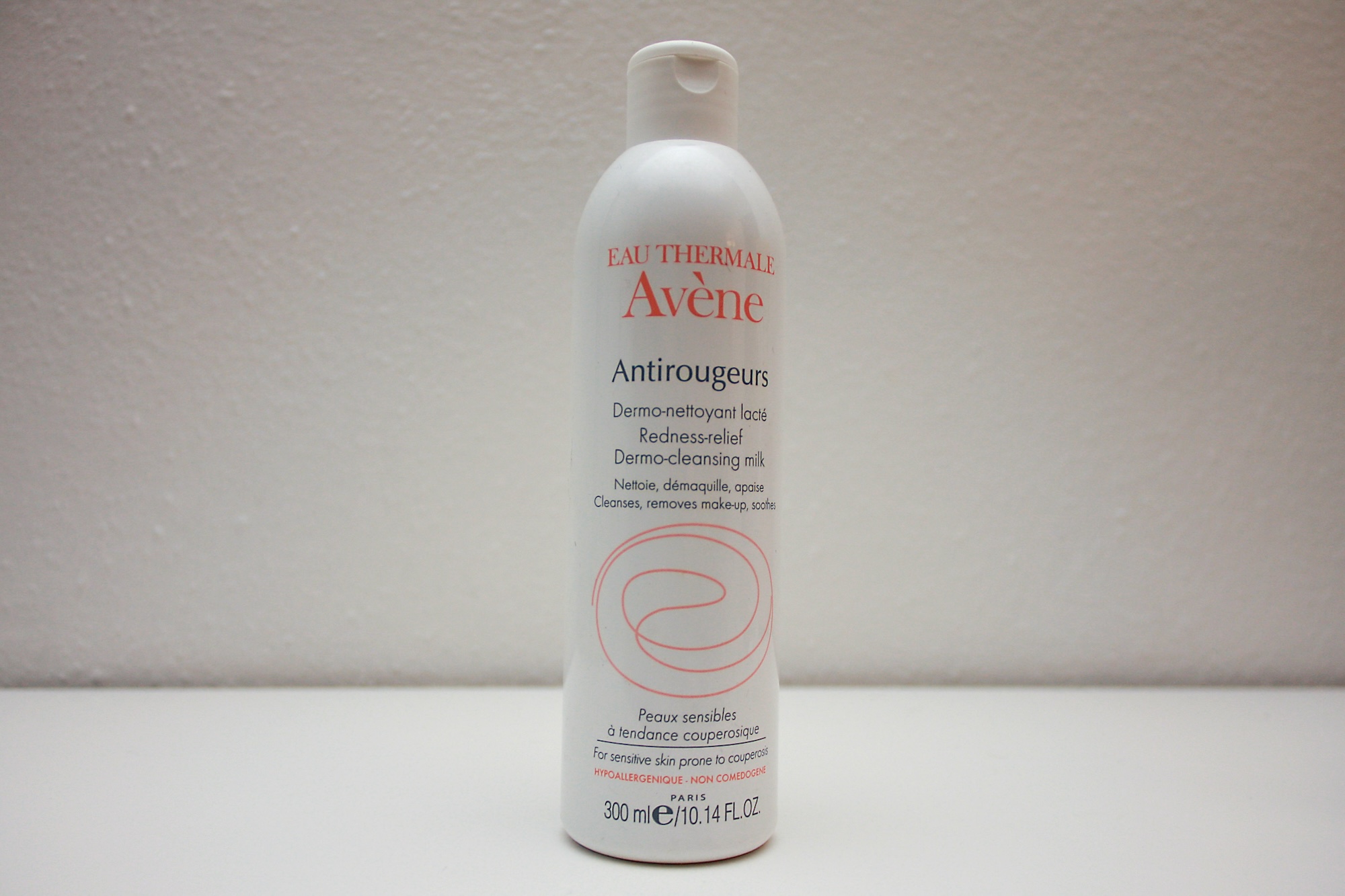 A bottle of Avène Antirougeurs Cleansing Milk 