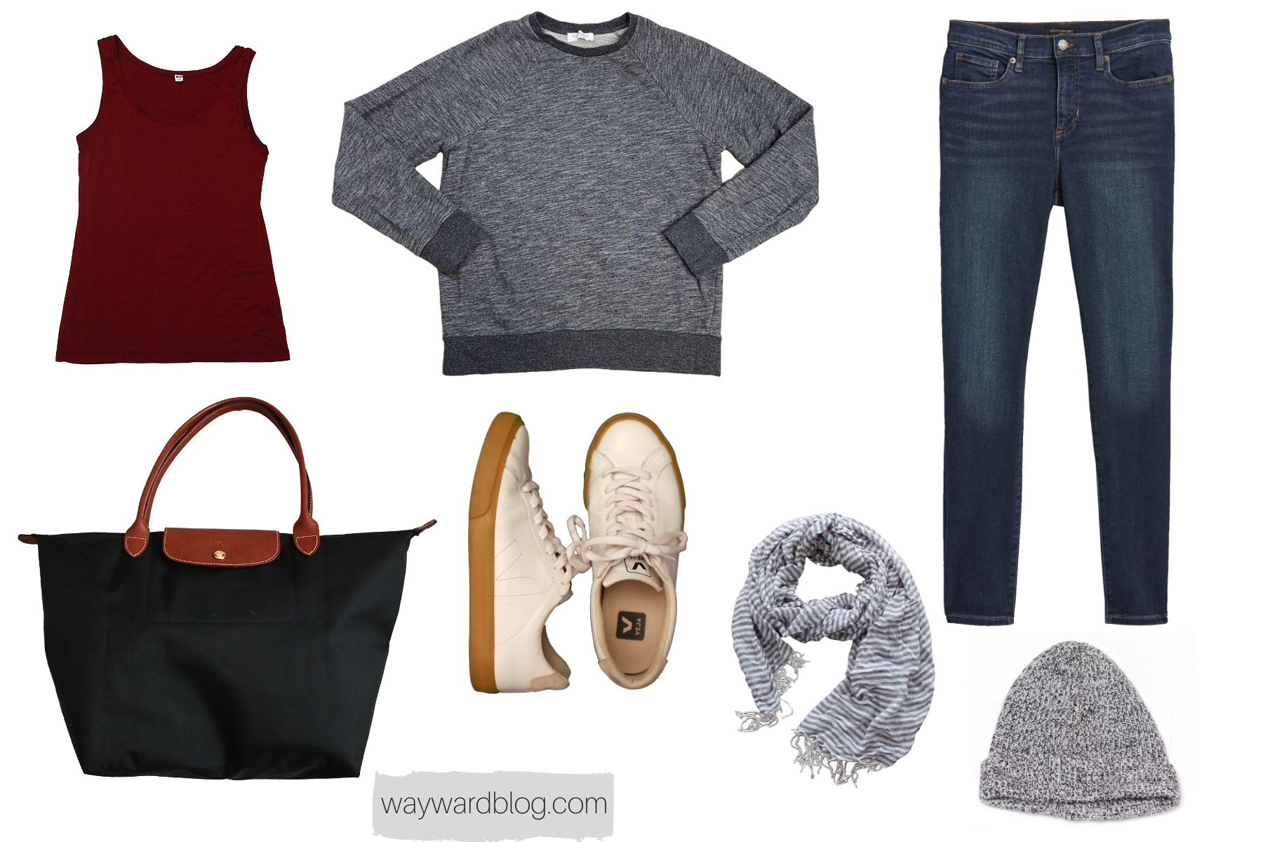 An airplane outfit with grey sweatshirt, blue jeans, and white sneakers