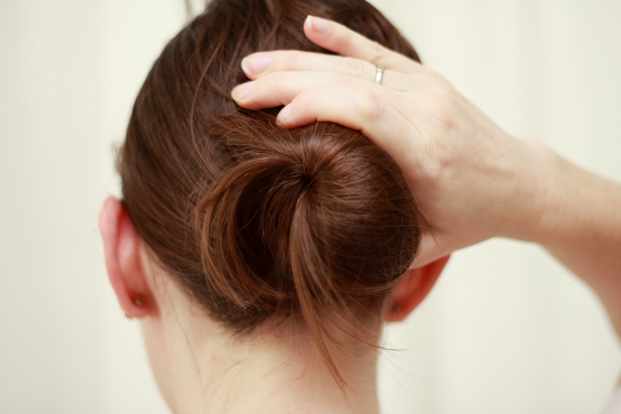 Alyssa creates an updo without any tools