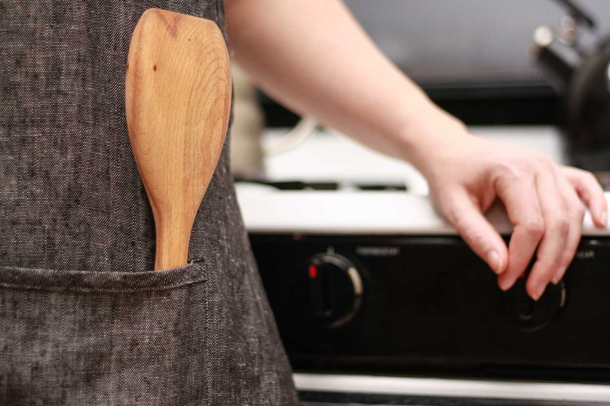 A spatula in an apron pocket