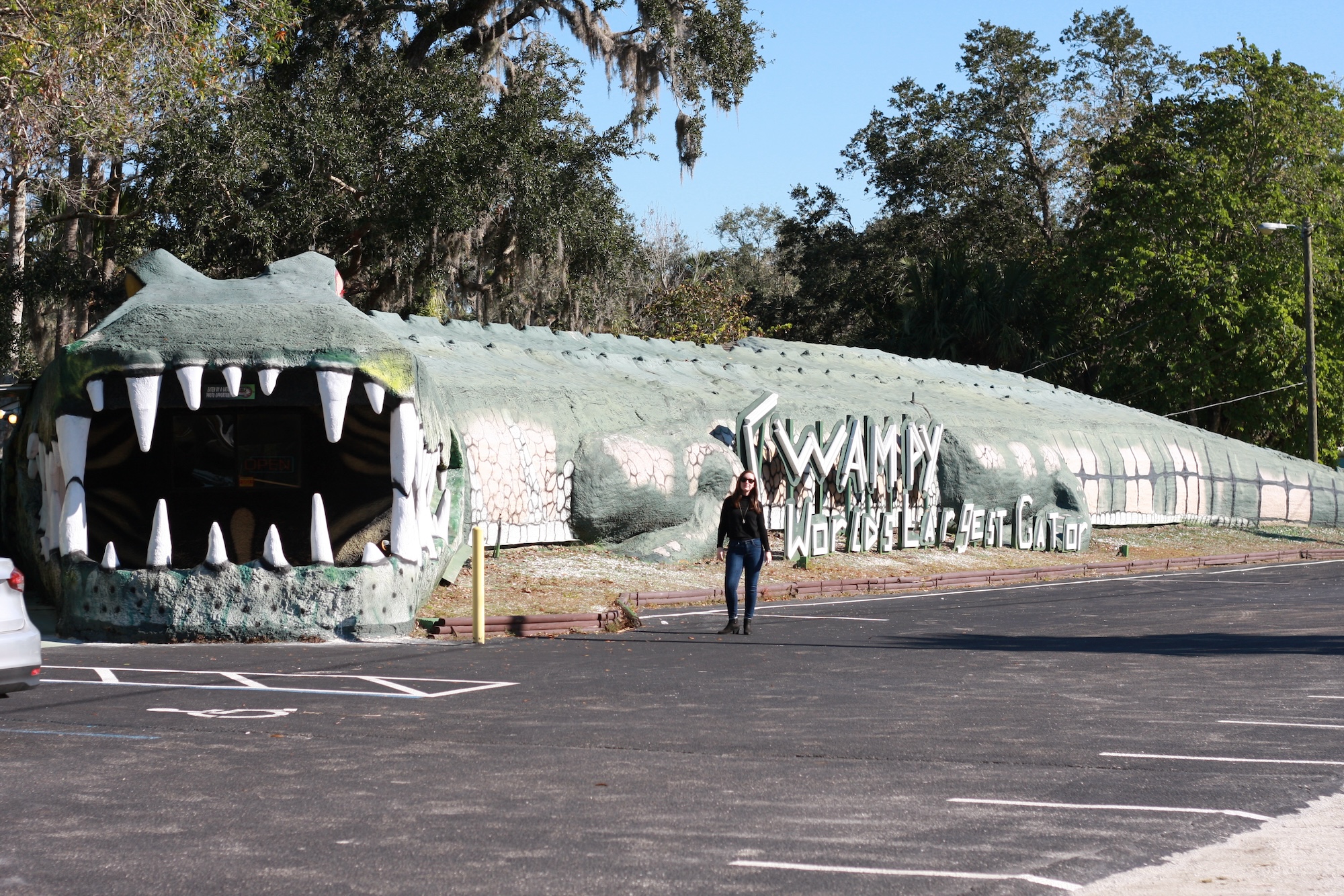  Alyssa stands in front of Swampy, the World's Largest Gator