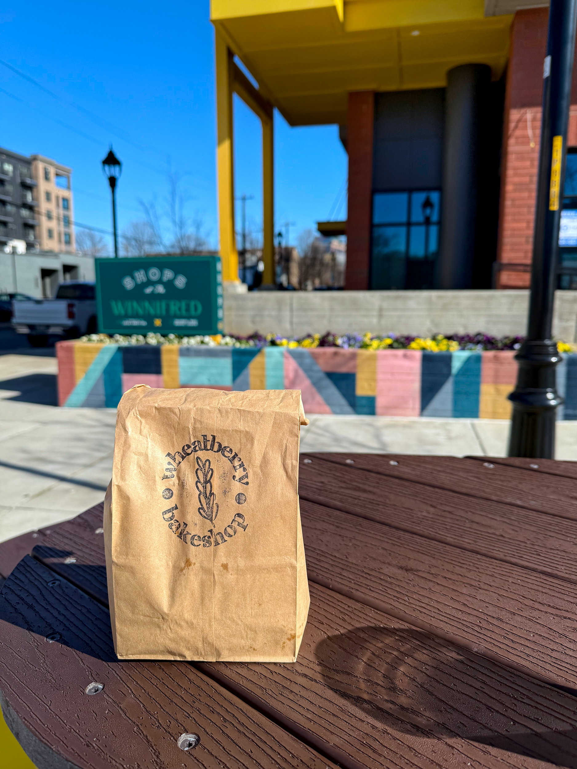 A bag of pastries outside The Winnifred in Charlotte