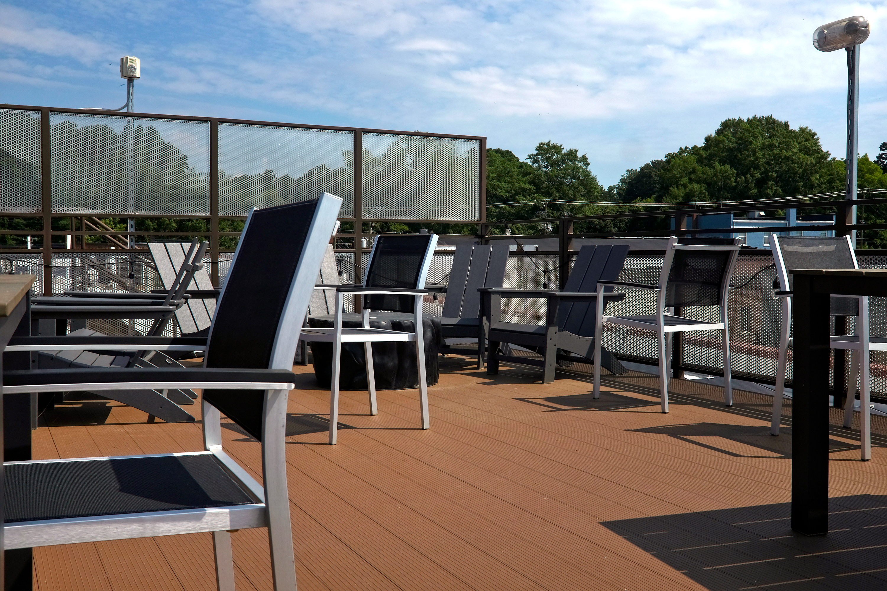 View of chairs on the roof deck at Three Trails