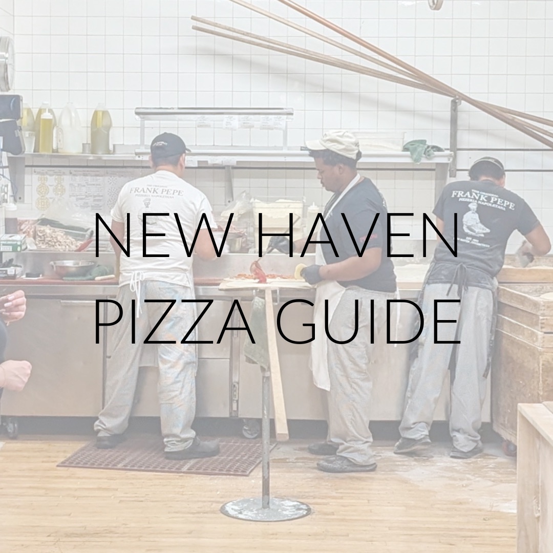 Workers in a pizzeria with text overlay "New Haven Pizza Guide"