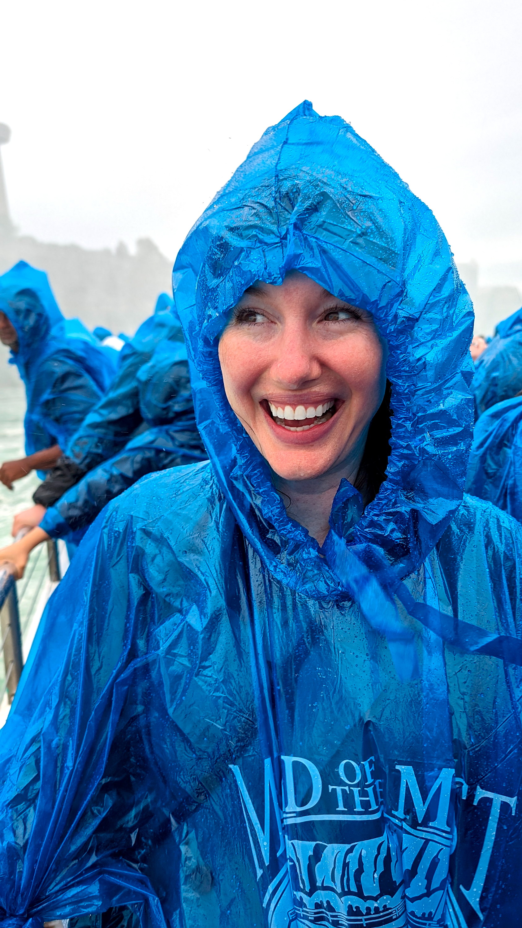 Alyssa wears a blue poncho