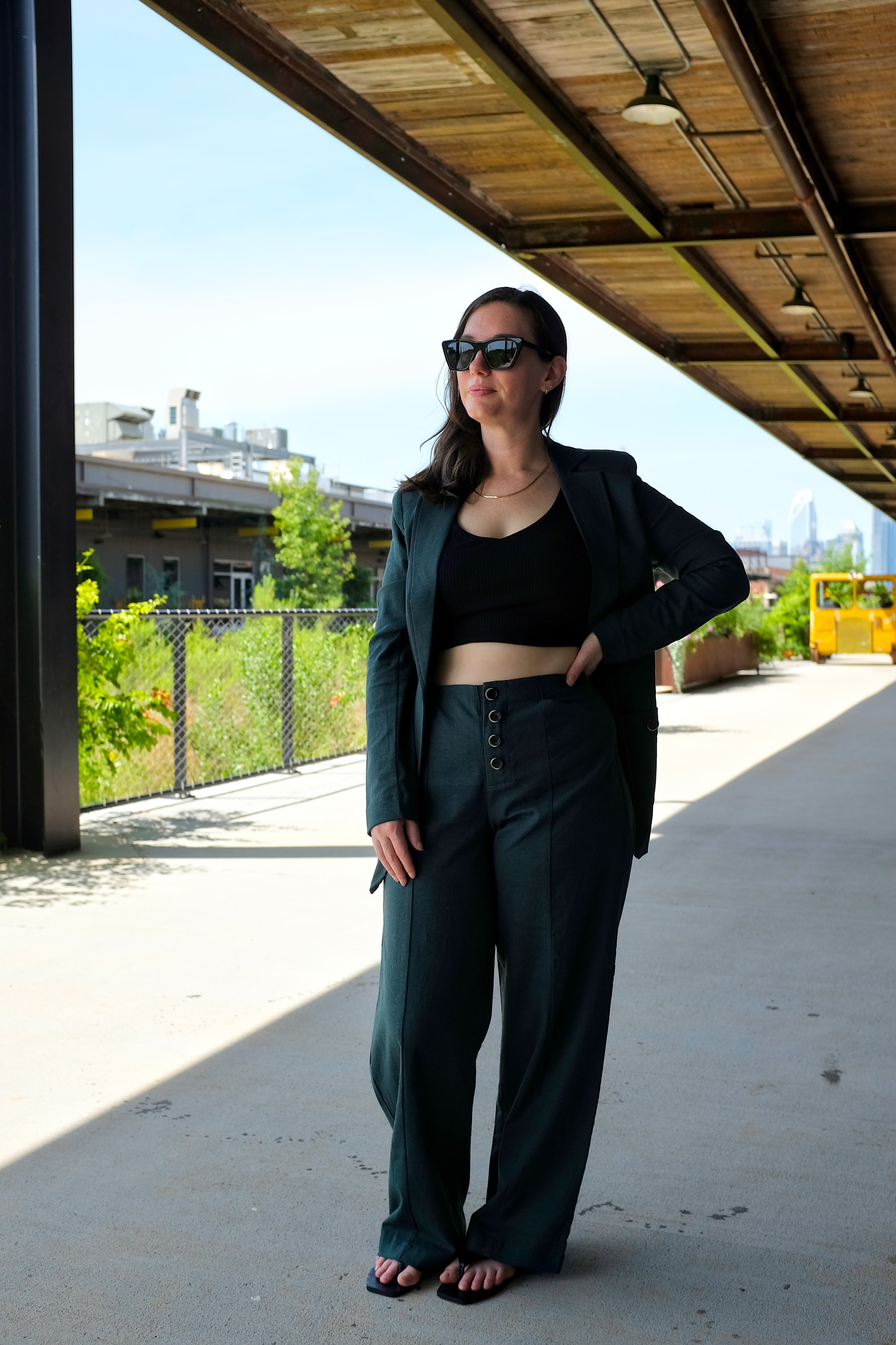 Alyssa wears the Coastal Linen Blazer from Universal Standard with matching pants