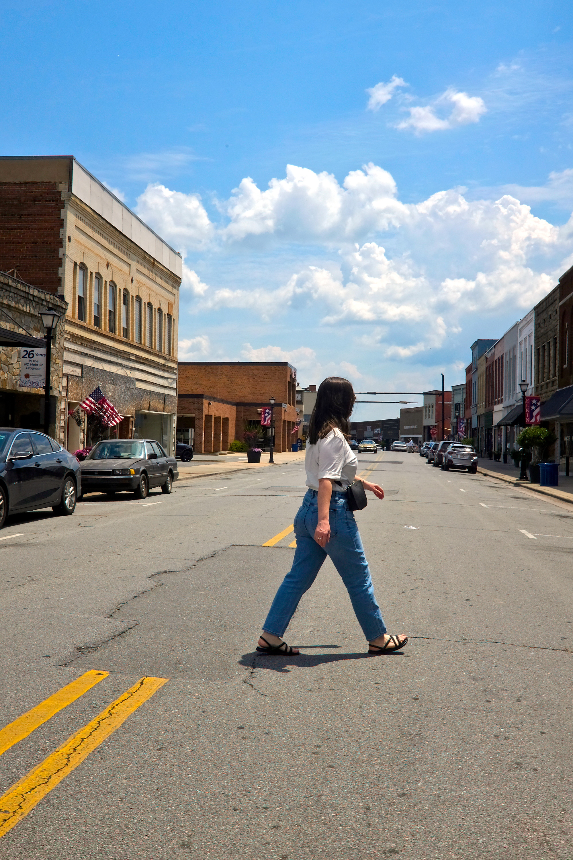 Alyssa crosses Main Street in downtown Elkin