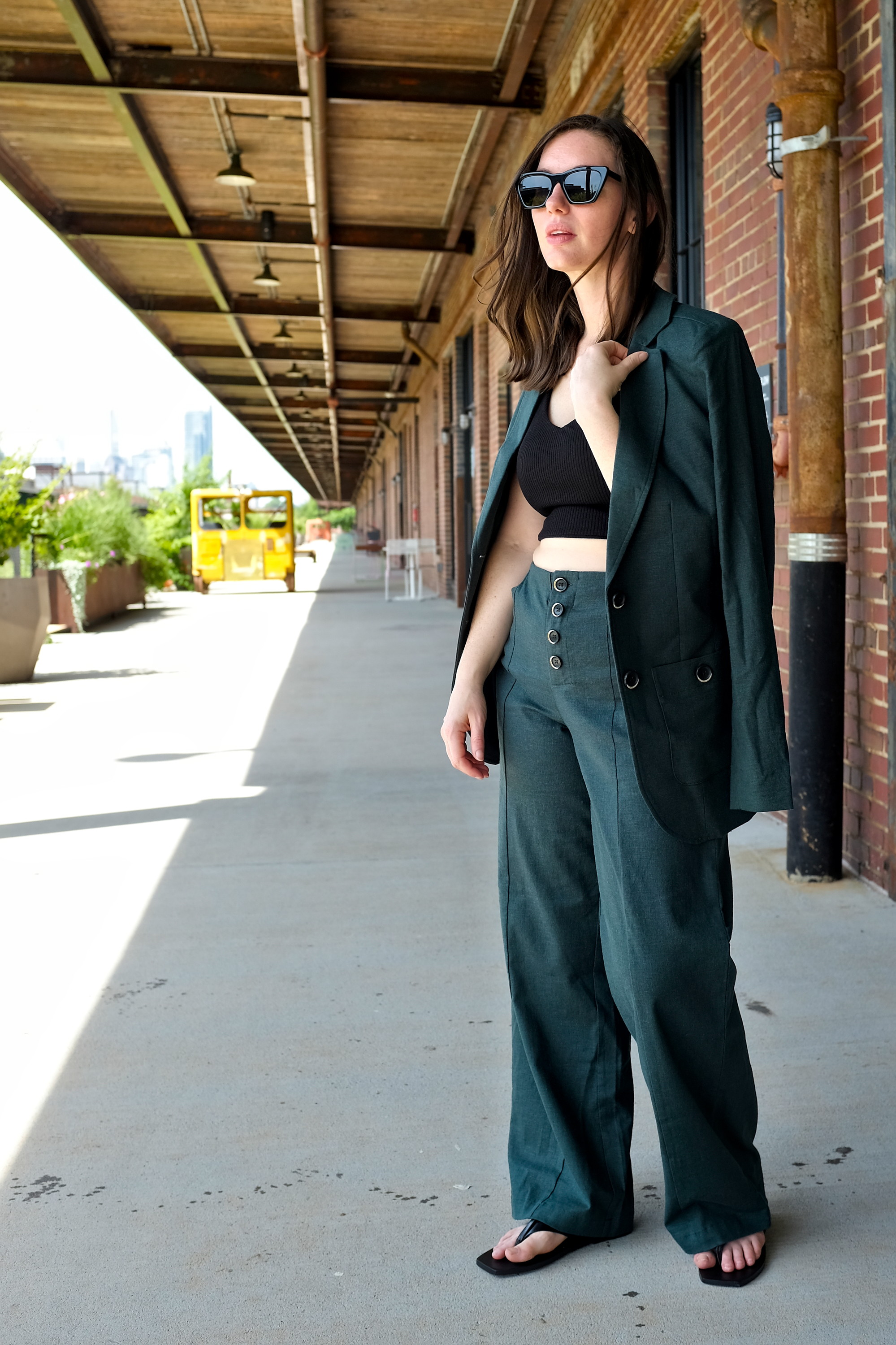 Alyssa wears a Coastal linen suit from Universal Standard