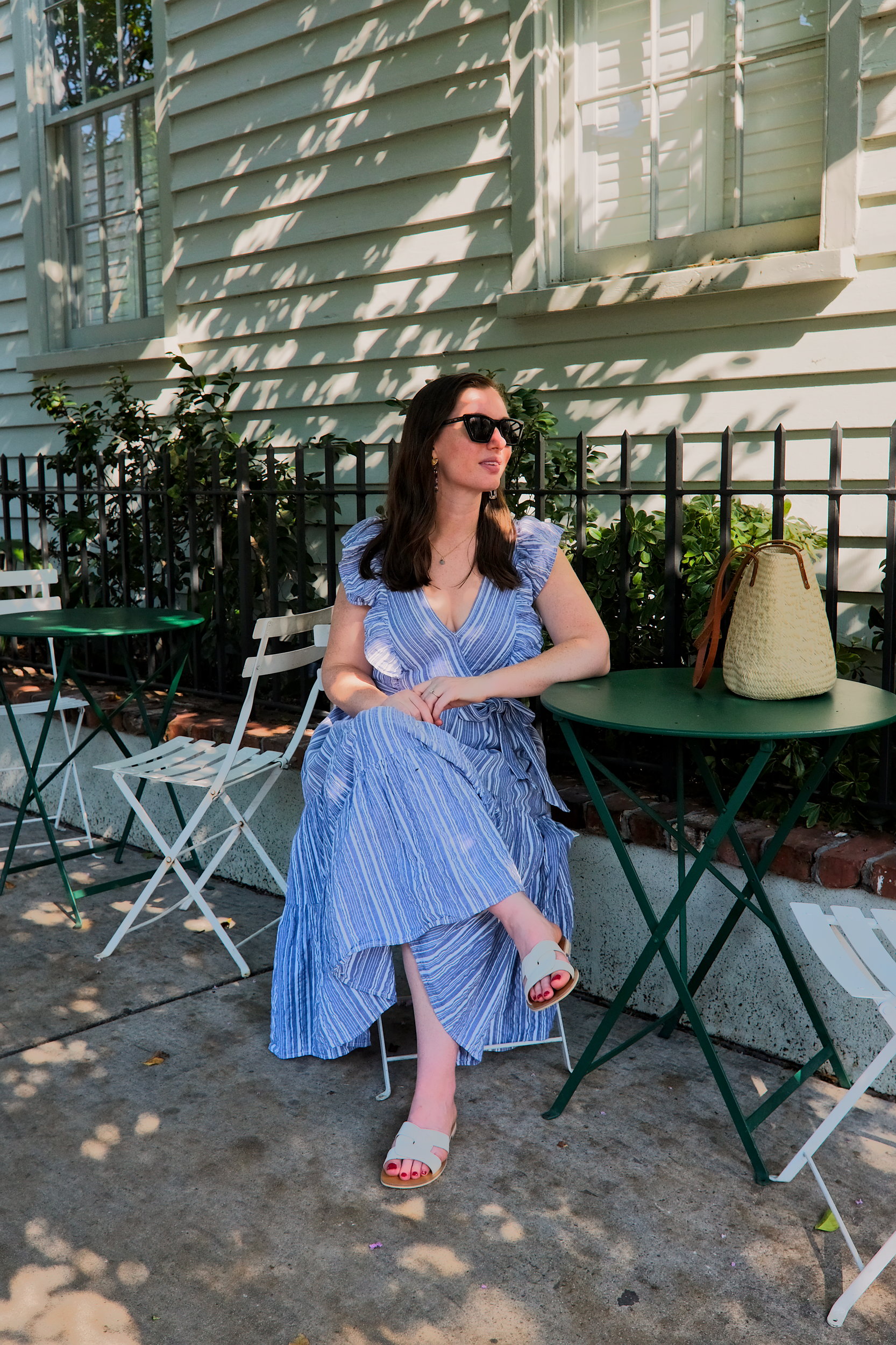 Alyssa sits at a table in Charleston