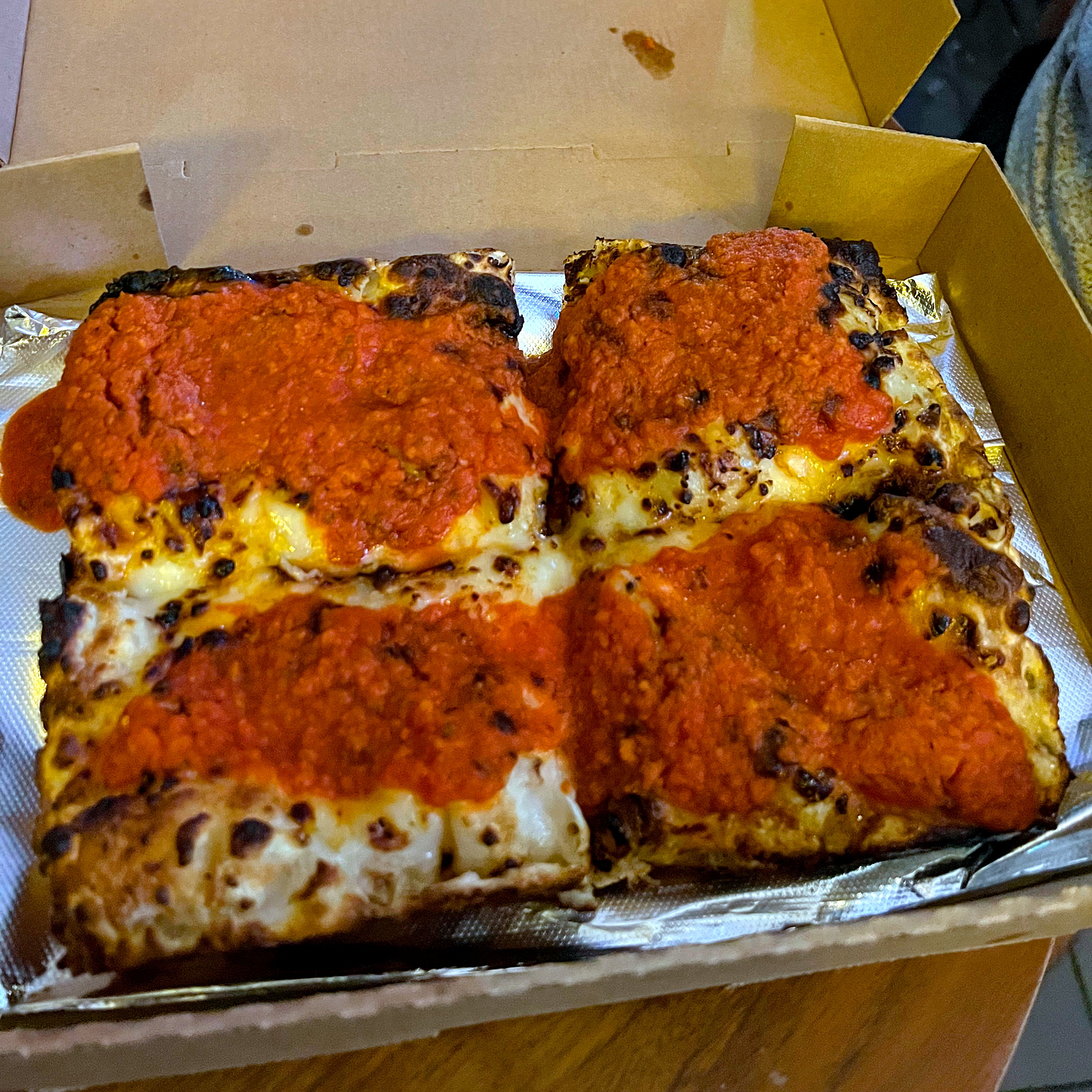 A box of vegan pizza