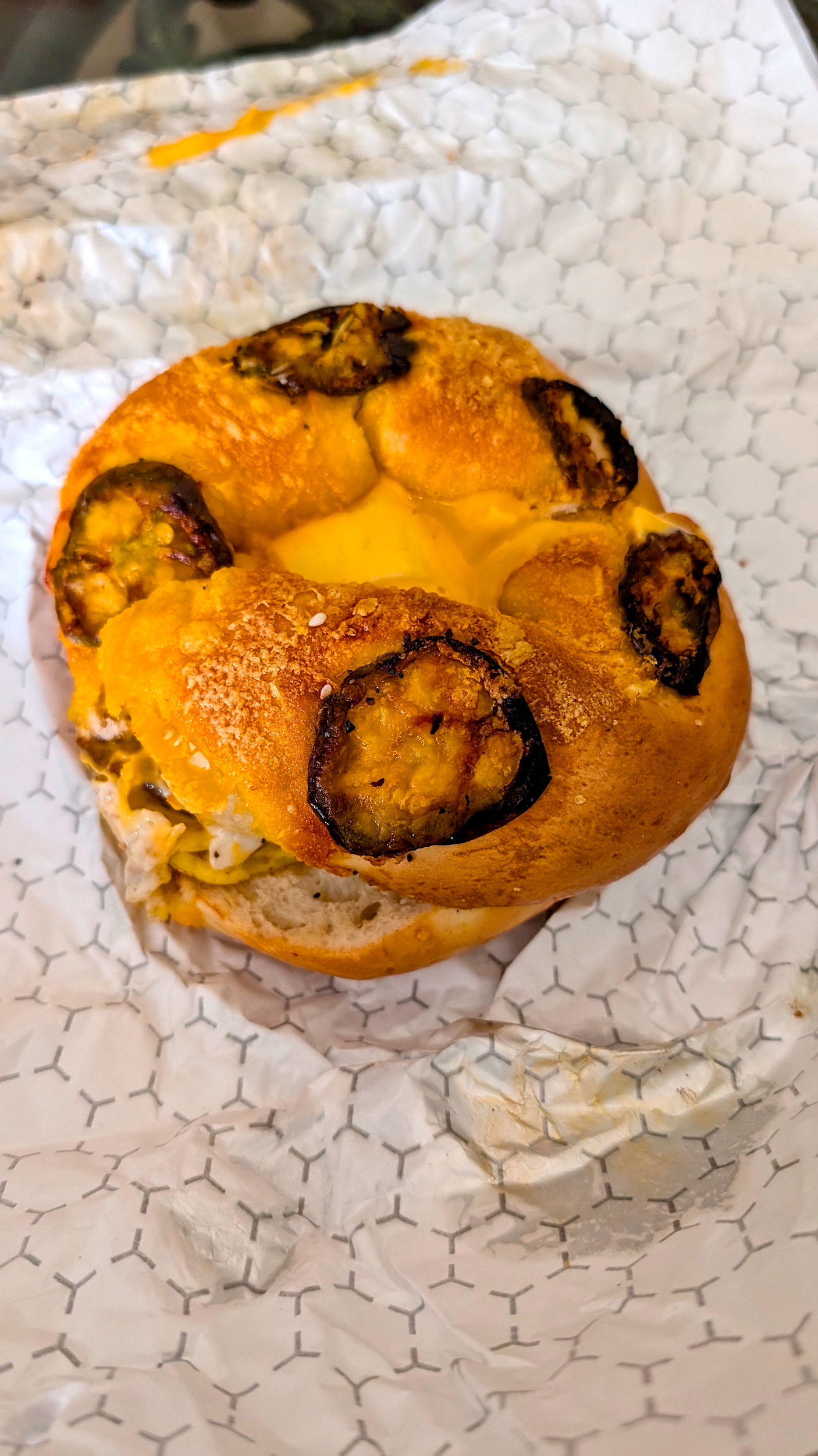 A jalapeno cheddar bagel at Holey City Bagels