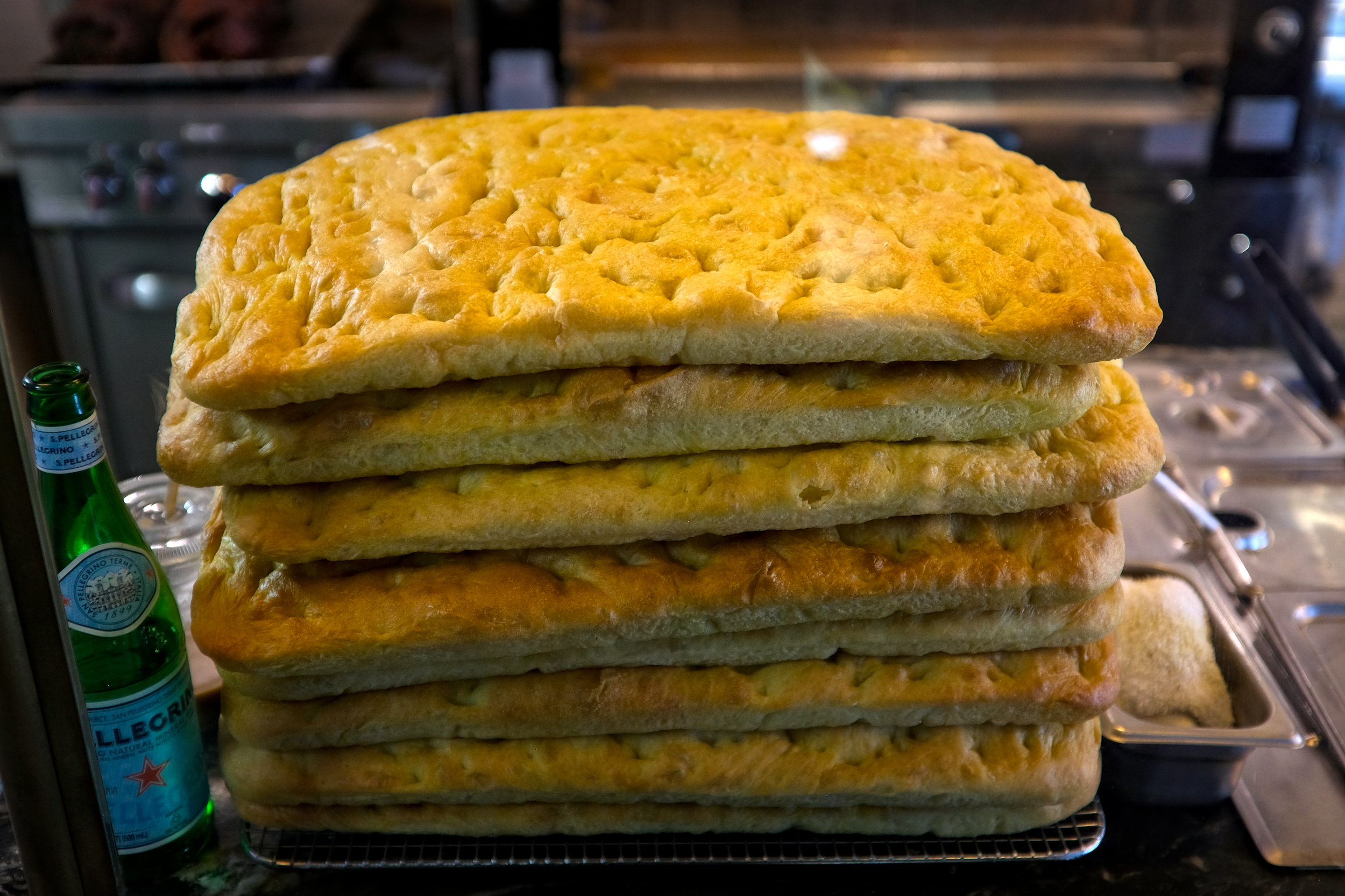 A stack of focaccia at Porchetta Shop