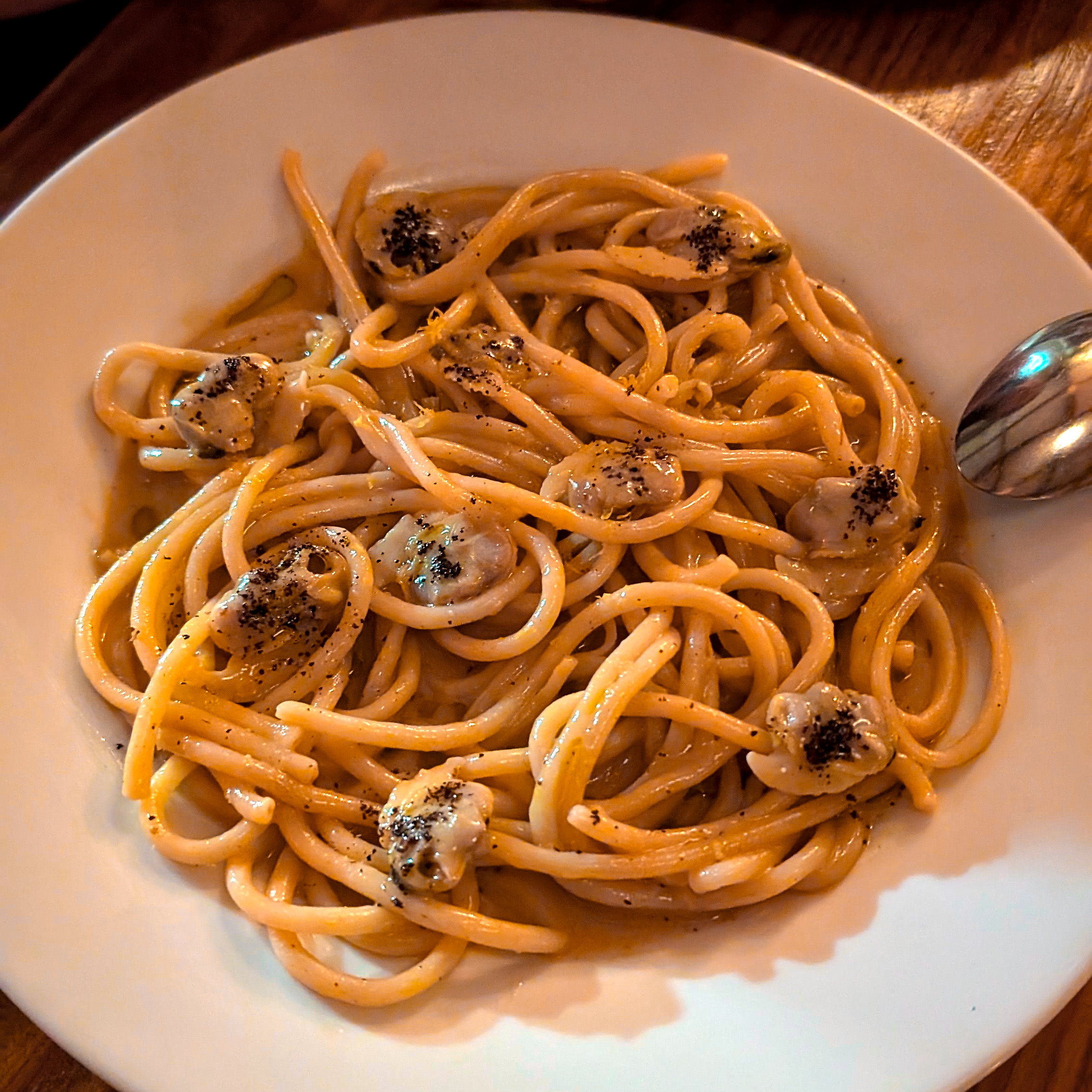 A bowl of clam pasta