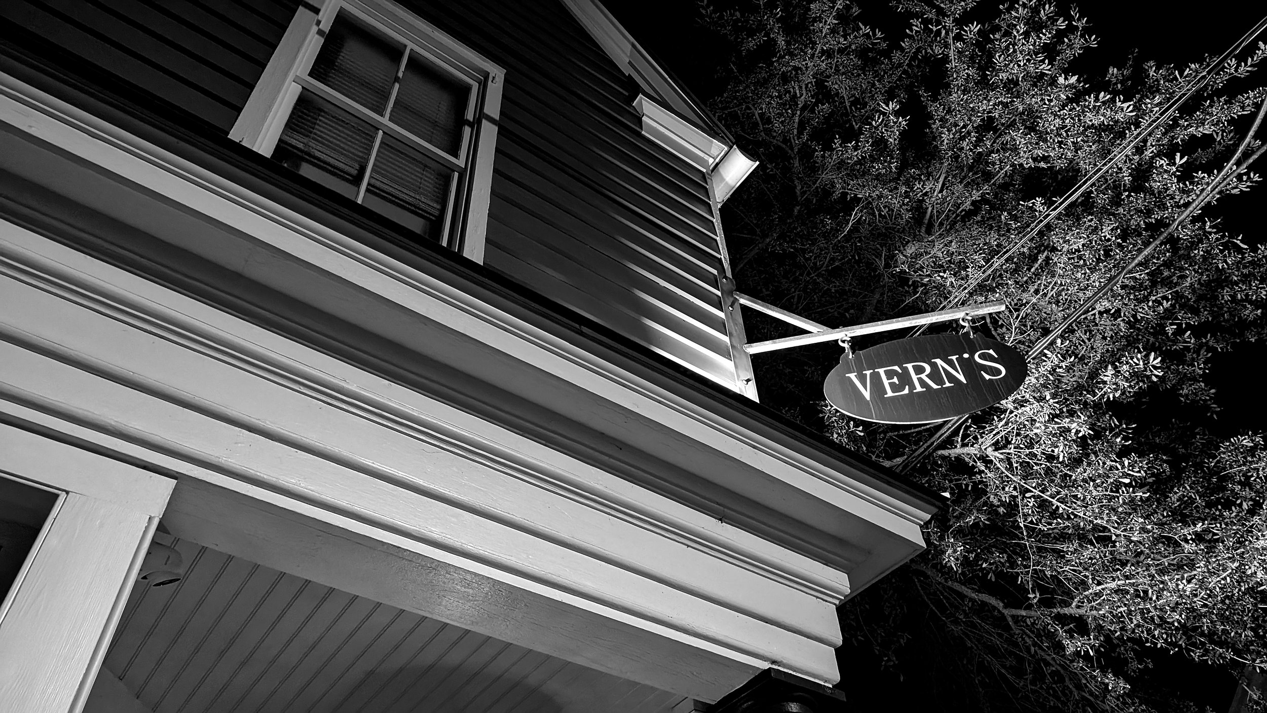 Exterior of Vern's restaurant in Charleston, SC, at night