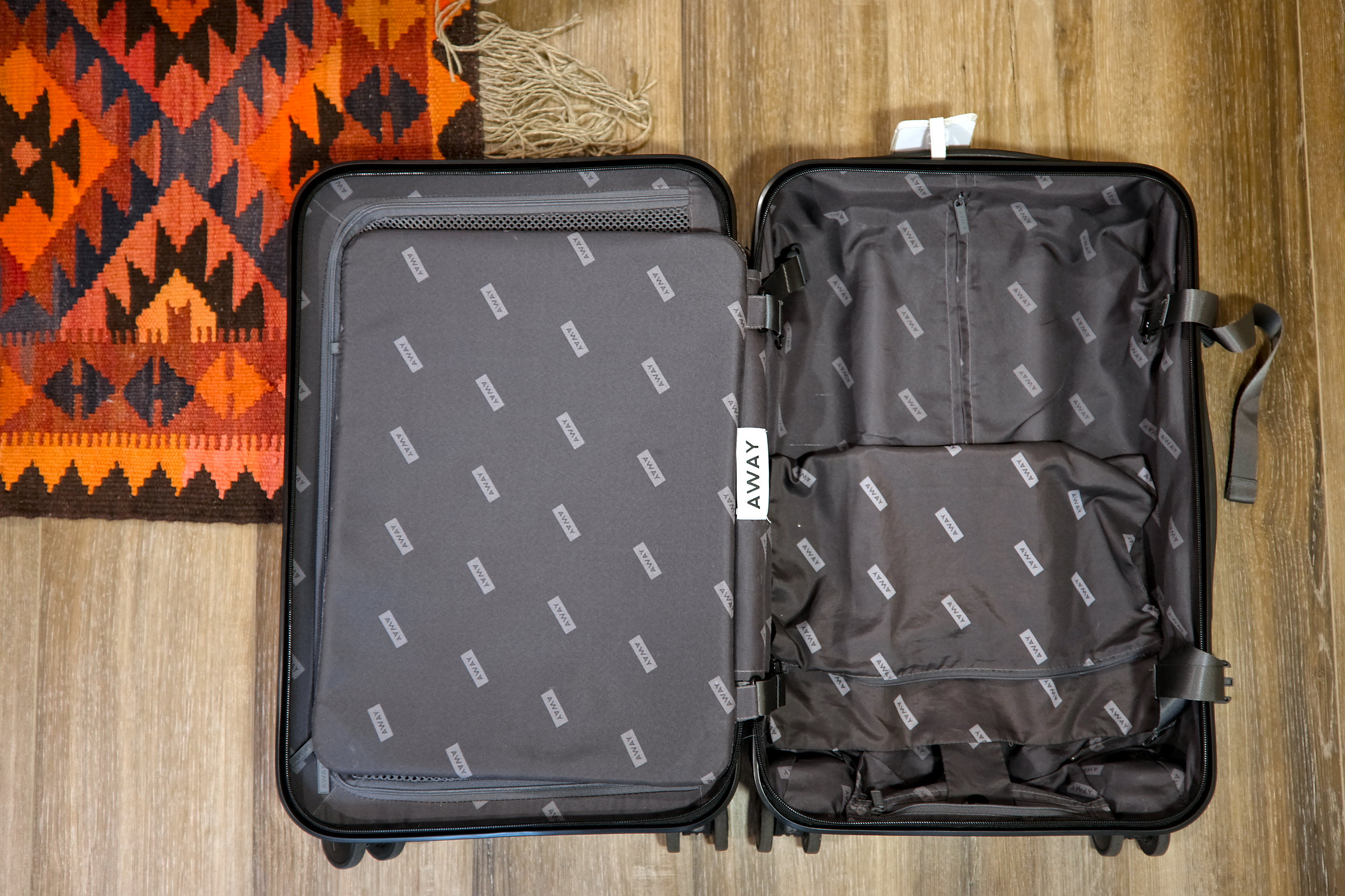 Interior of the Away suitcase with the compression pad opened