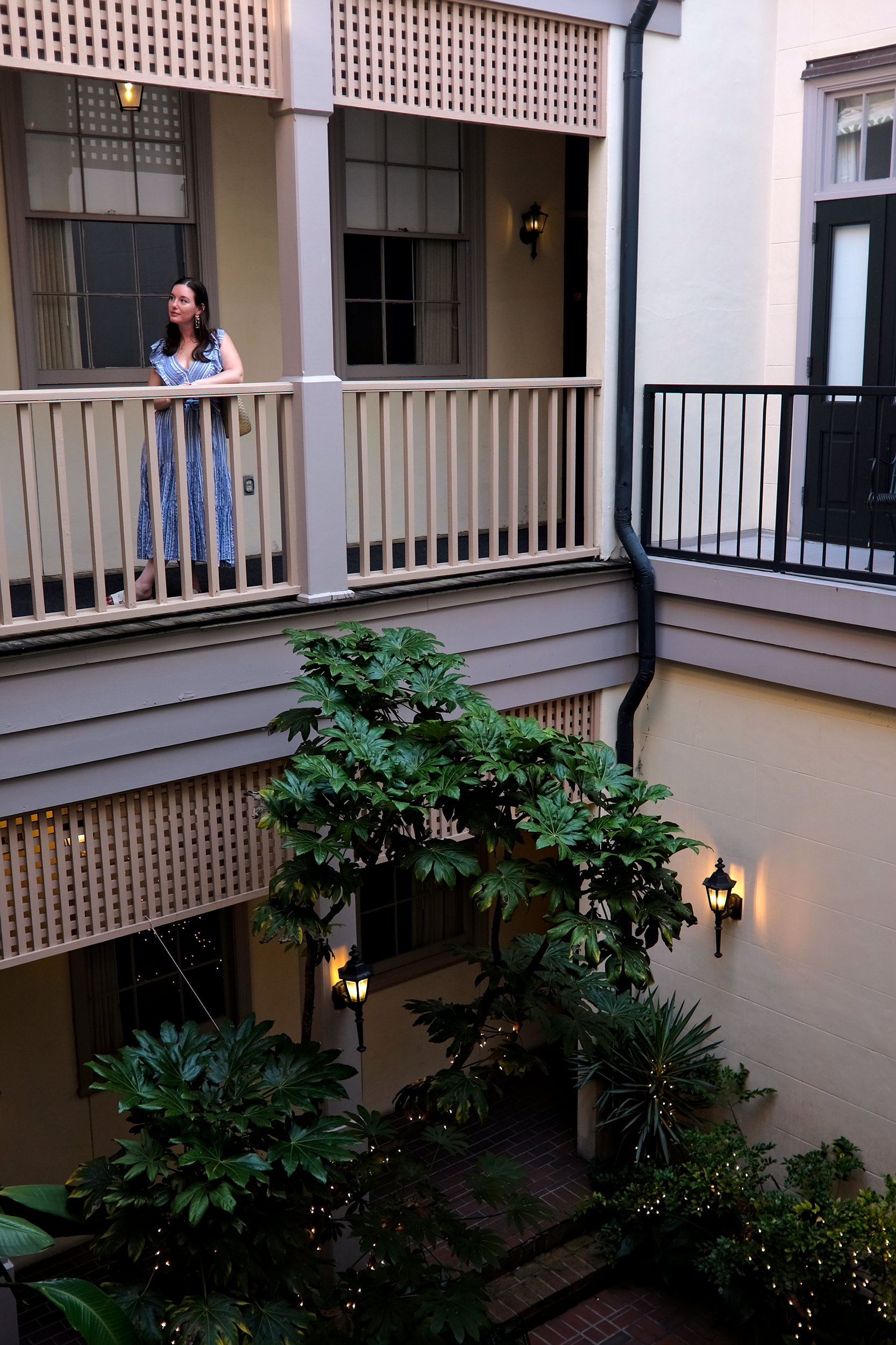 Alyssa on a balcony at Kings Courtyard Inn