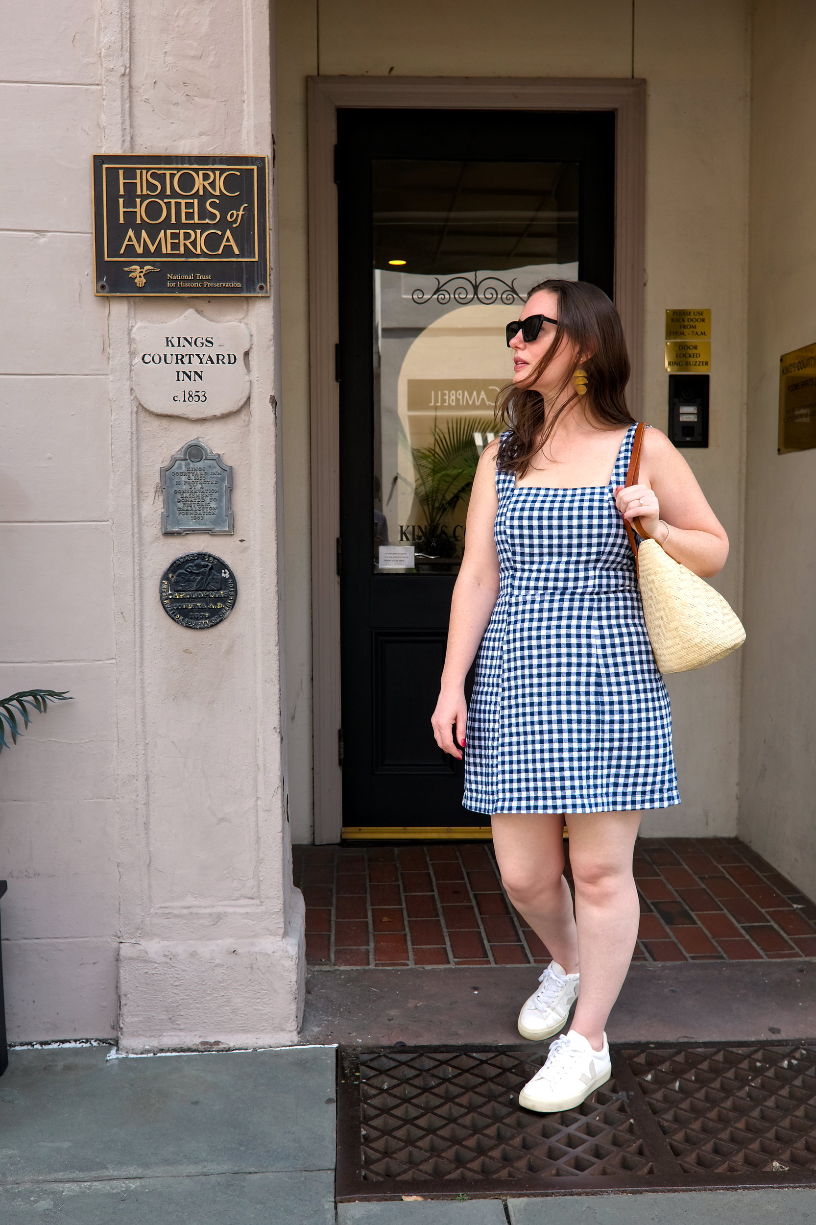 Alyssa walks out the front door at Kings Courtyard Inn