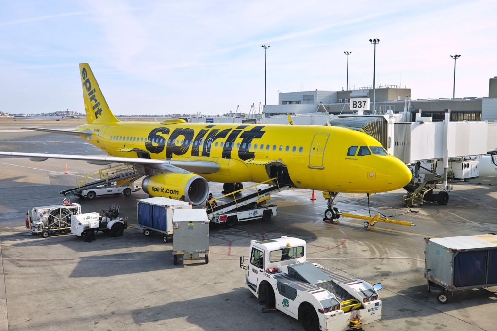 A Spirit plane at an airport