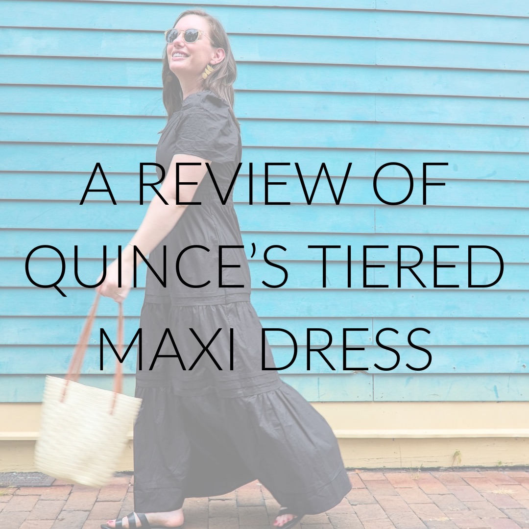 Alyssa wears a black dress with text overlay "A Review of Quince's Tiered Maxi Dress"