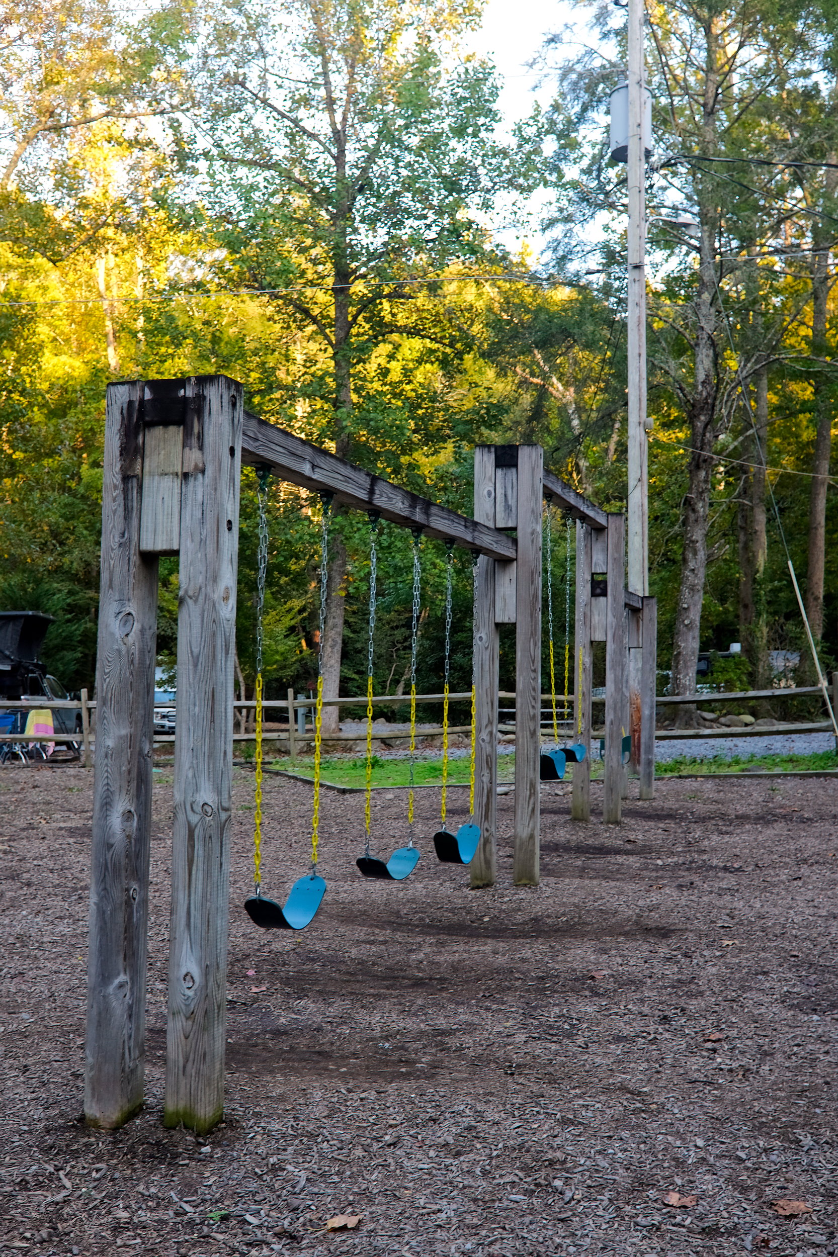 A swingset in the campground