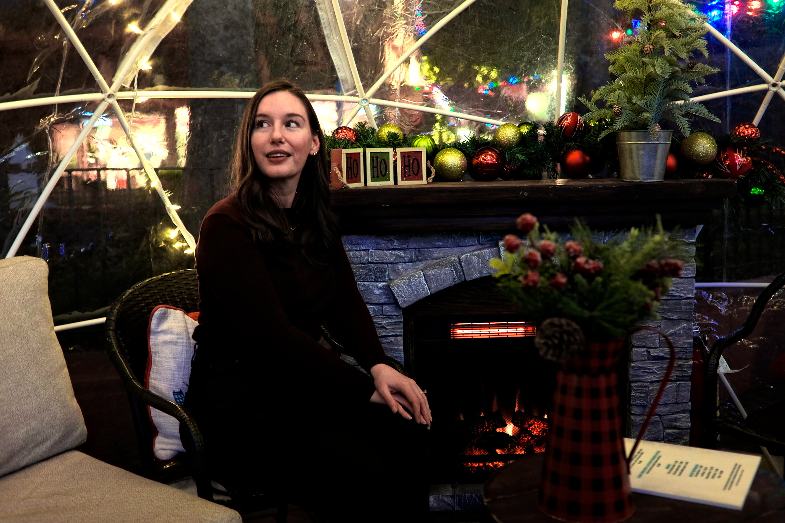 Alyssa in an igloo at WinterFest, one of Charlotte's best holiday events