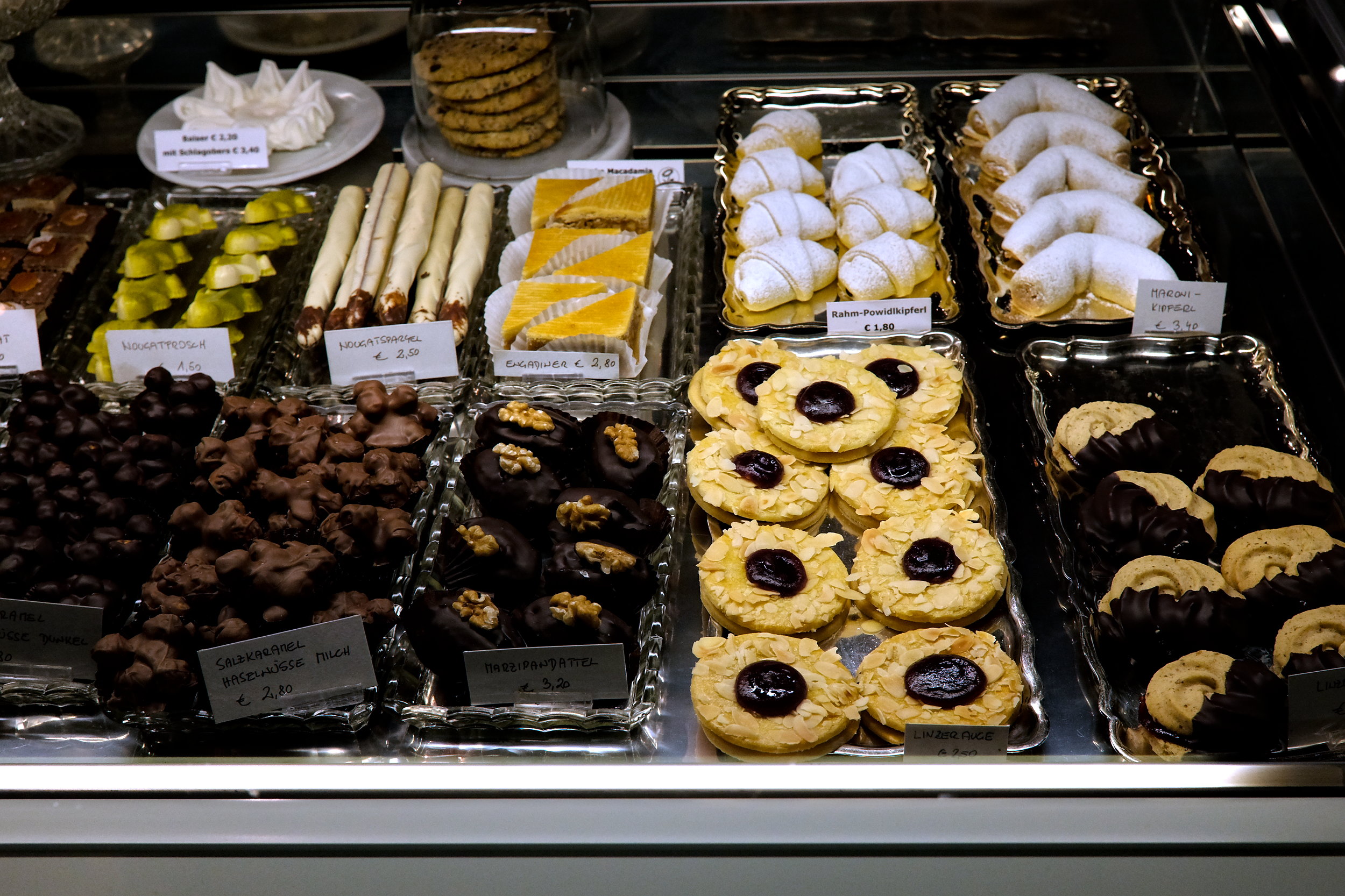 A display case of cookies at Café Konditorei Ingrid Bürger