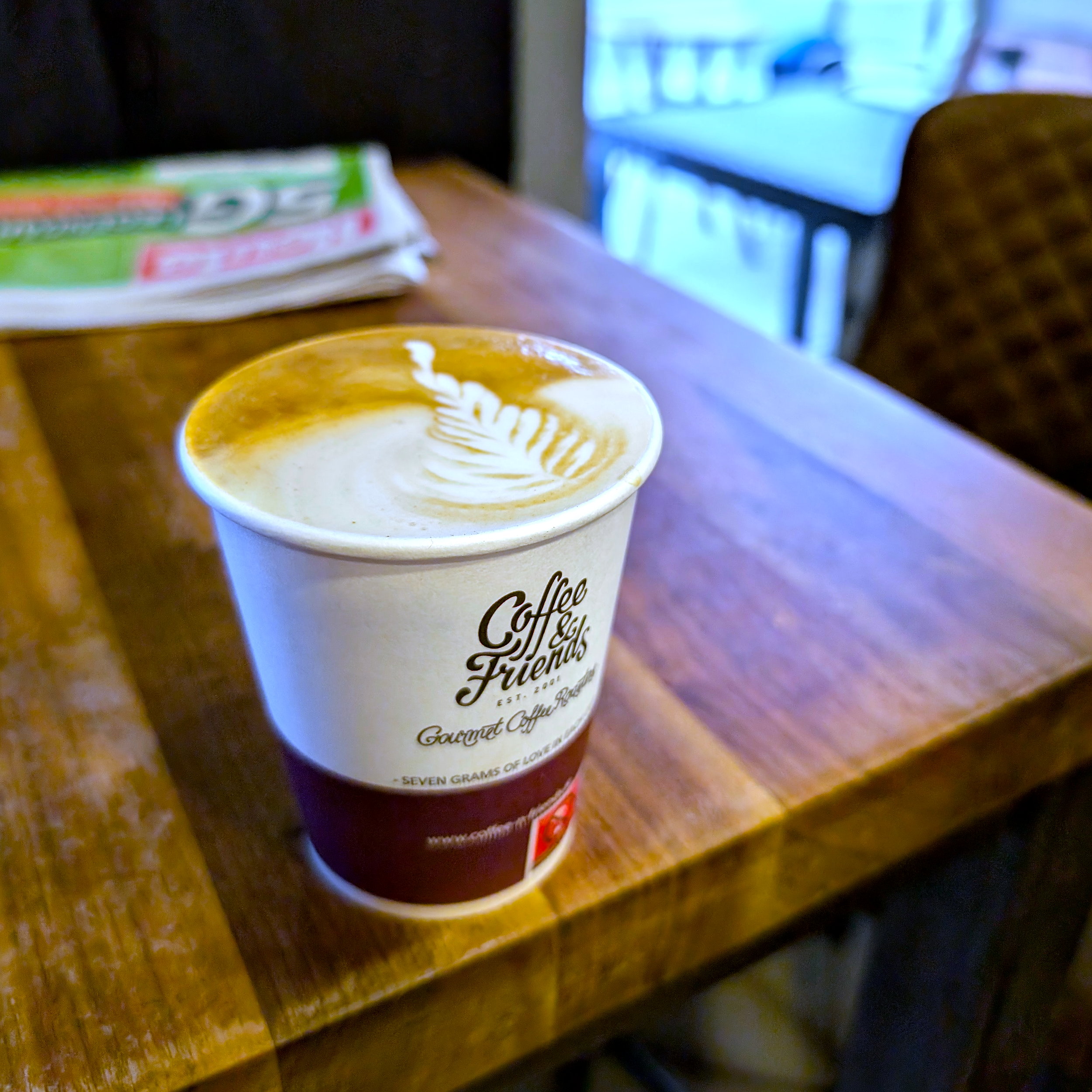 A coffee on a table at Coffee & Friends