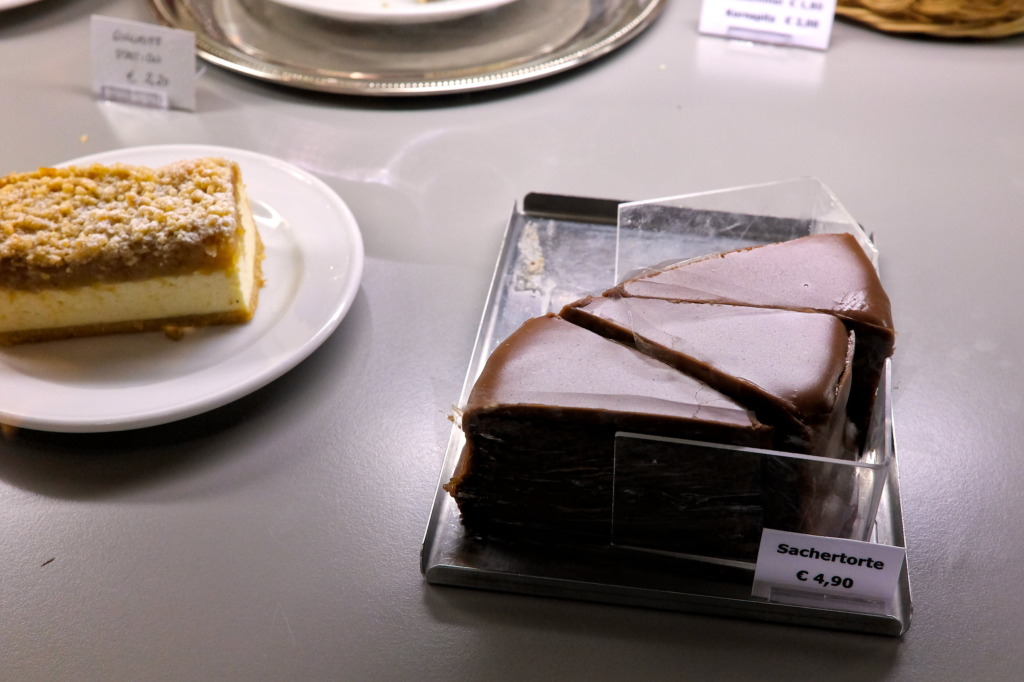 Slices of Sachertorte in a display case