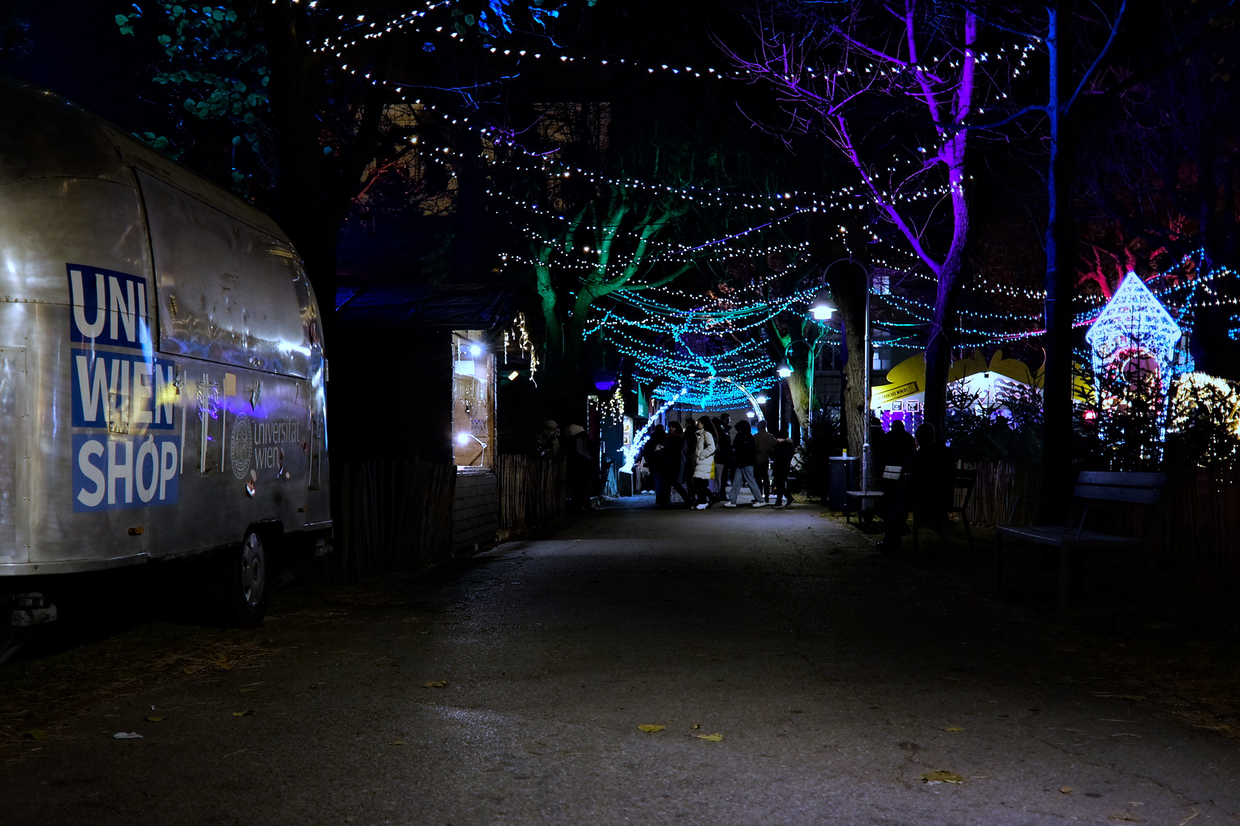 Lights and vendors at the University of Vienna campus Christmas market