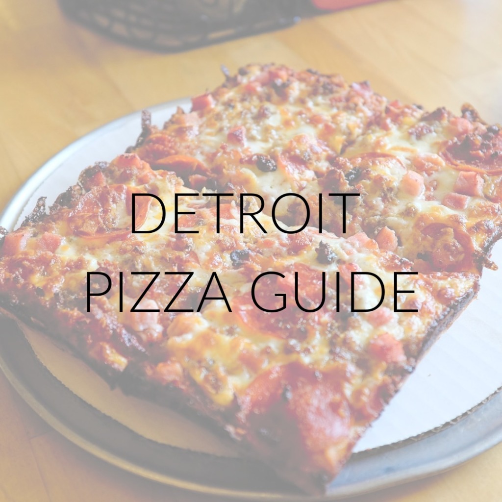 A pizza with text overlay "Detroit Pizza Guide"