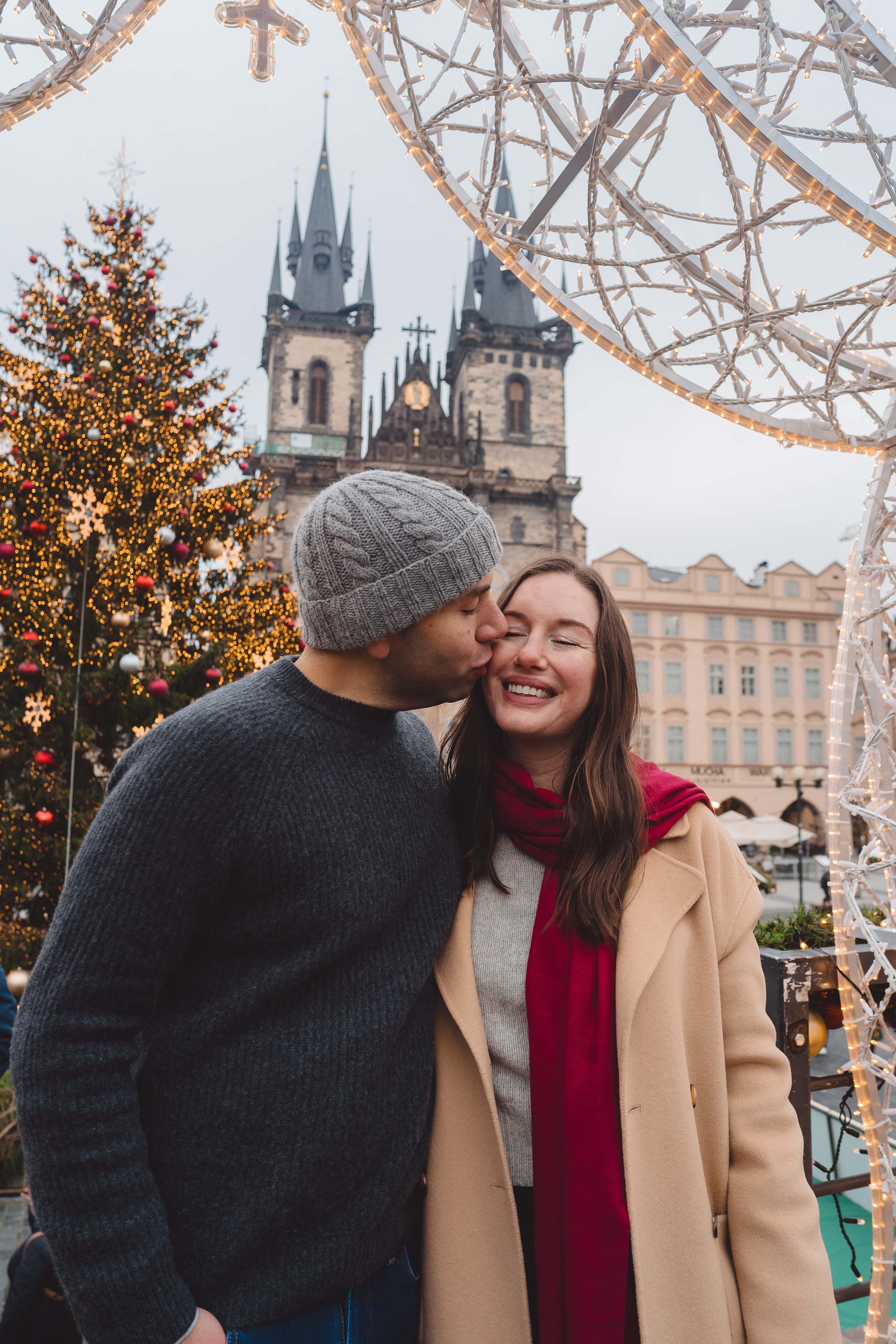 Alyssa and Michael at the Christmas market in Prague's Old Town Square