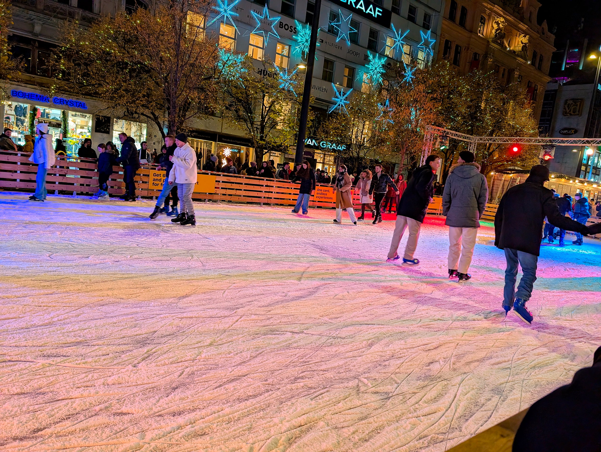 Ice skaters at a Prague Christmas market