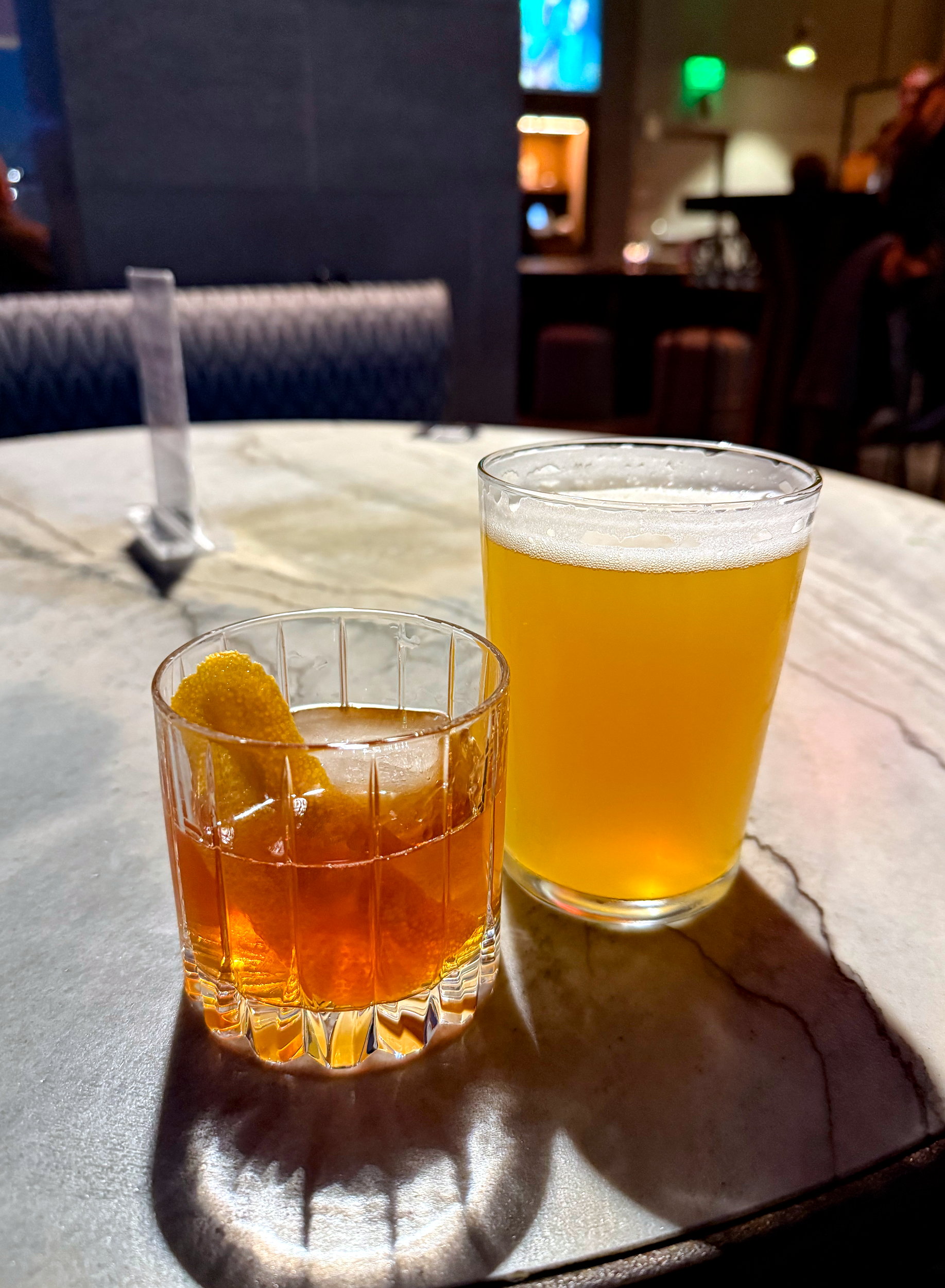 A cocktail and a beer at The Nolen