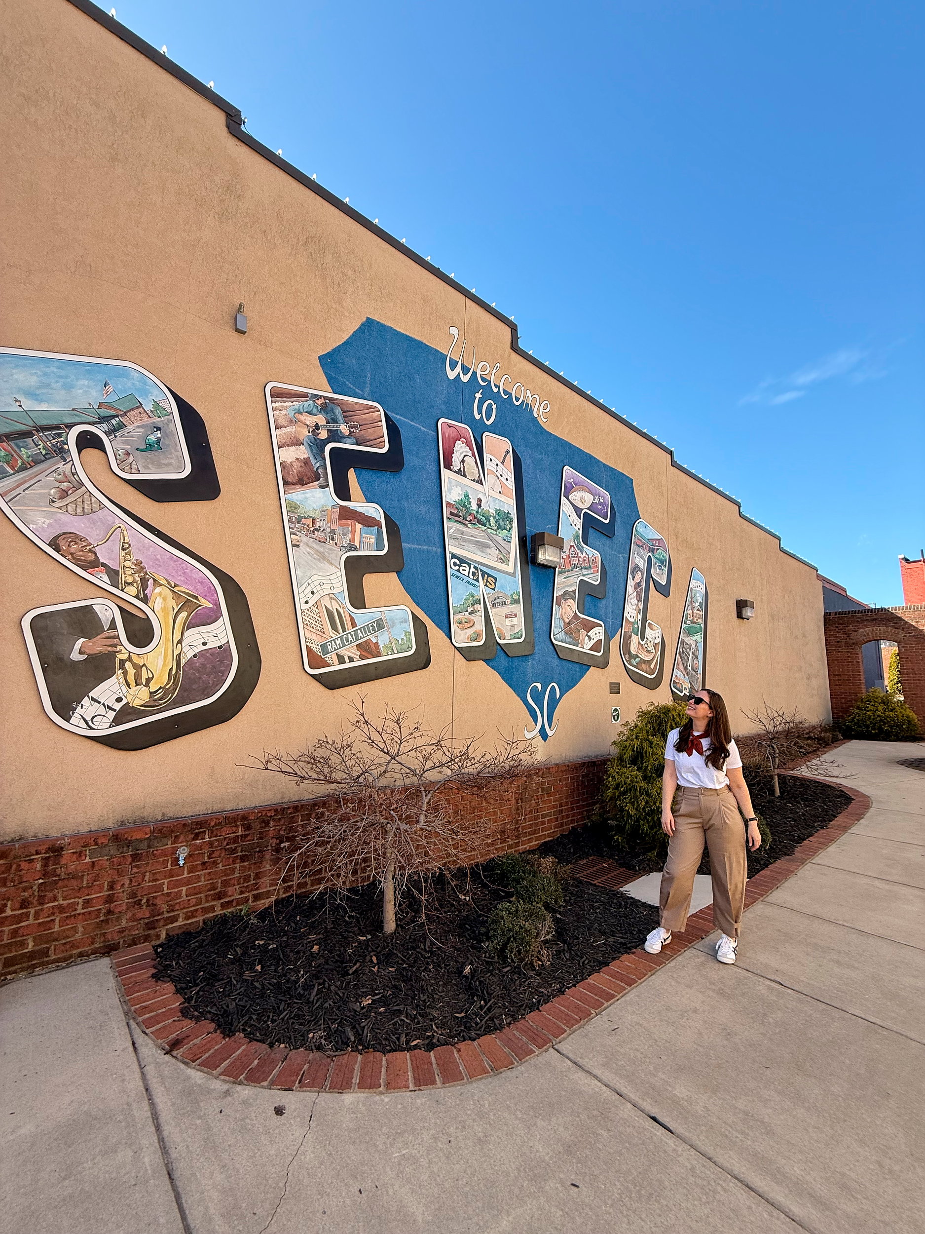 Alyssa in front of the Seneca mural