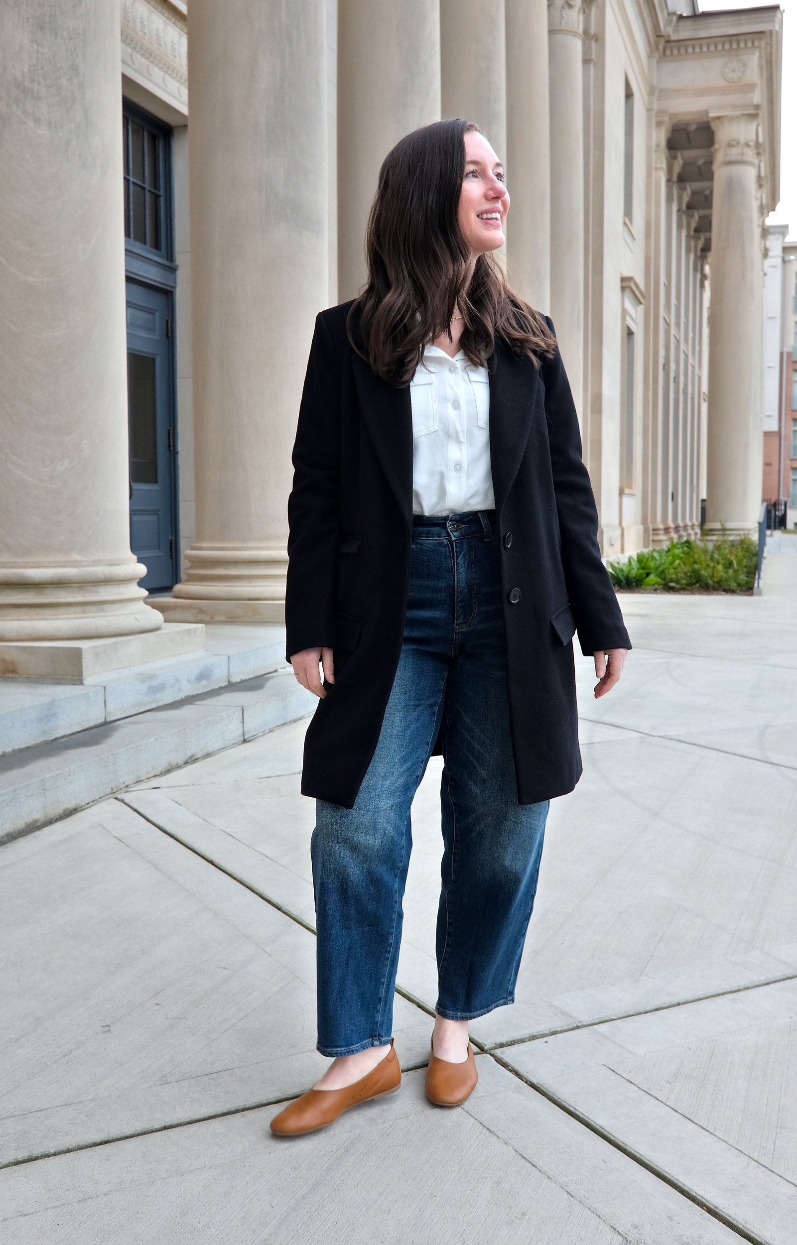 Alyssa wears the Harlow Classic Wool Coat open