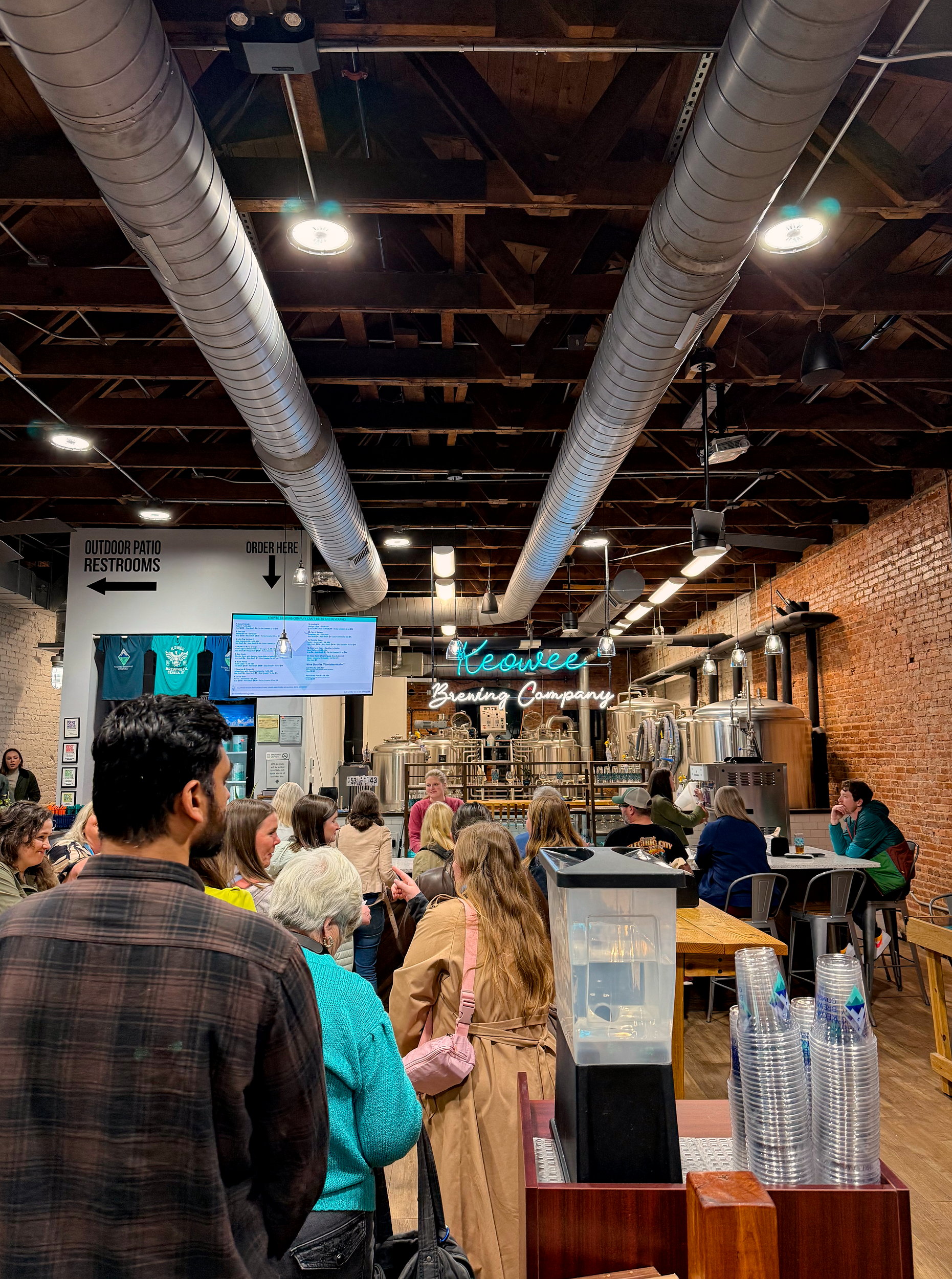 A crowd waits in line at Keowee Brewing Company