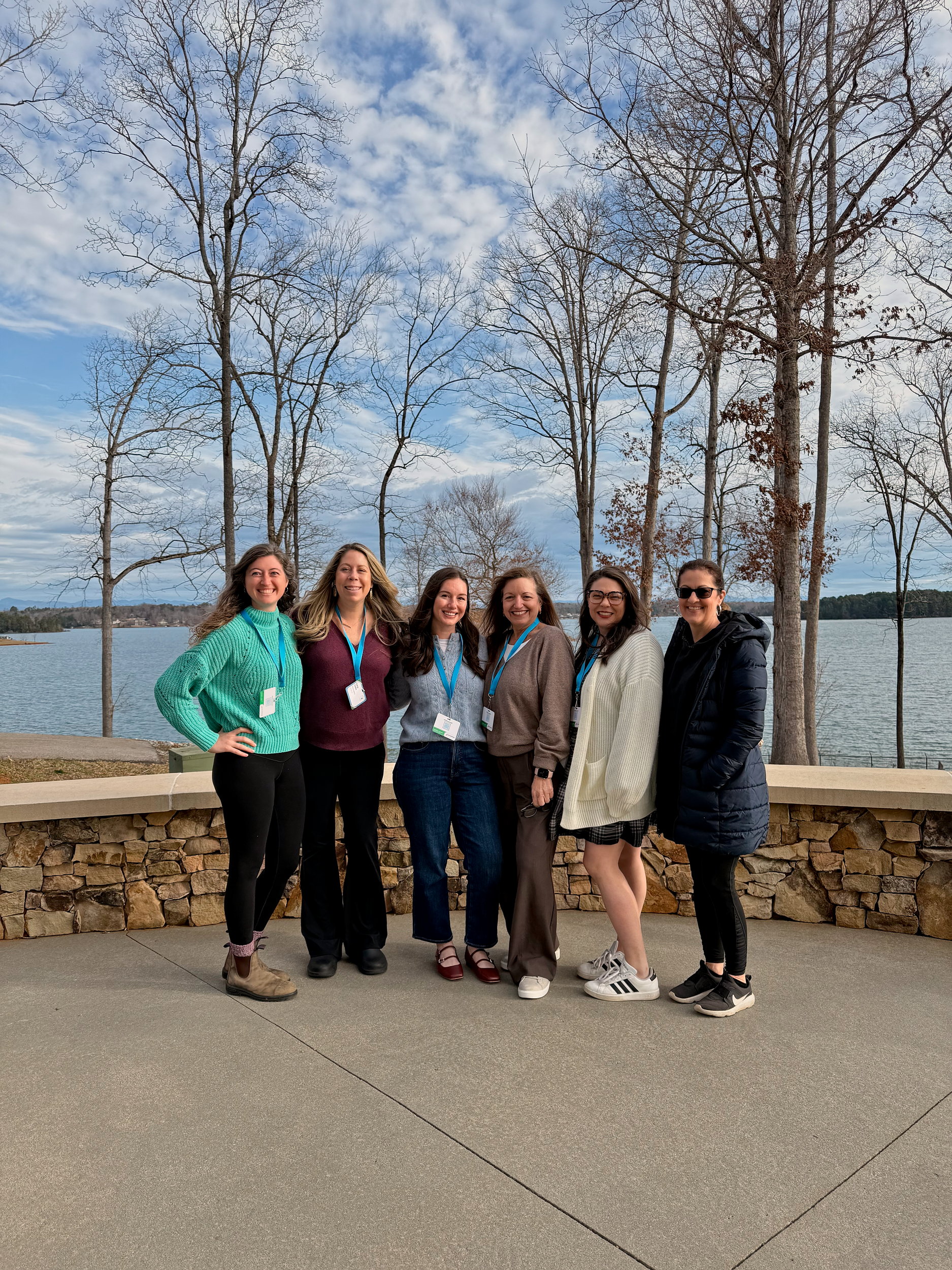 Six North Carolina travel bloggers at a lake in Oconee County