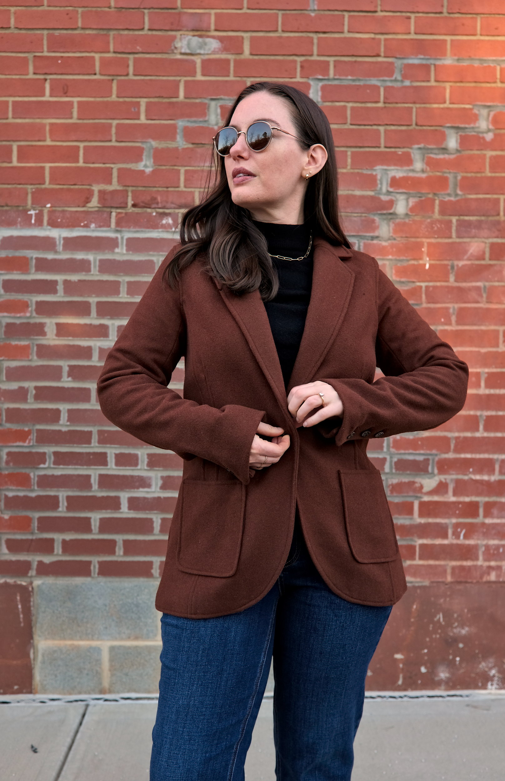 Alyssa buttons a wool jacket from Universal Standard