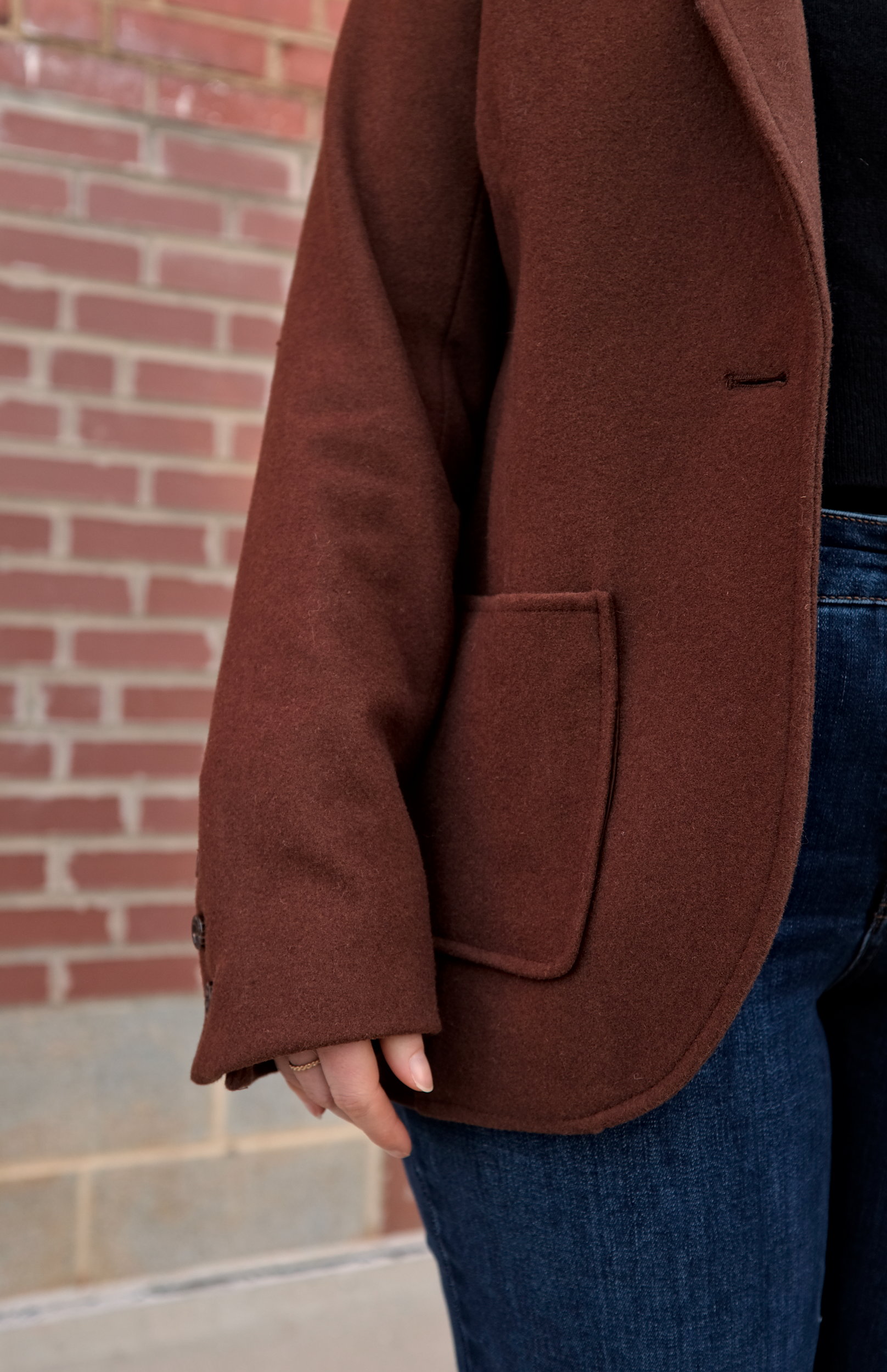 A close up of the pocket on the Kidjo jacket